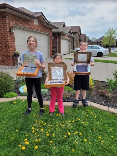 Carbon footprint activity: Students display their solar ovens